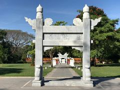 04A A pathway leads thru two pillars and past guardian lions to The Seat of Heaven Chinese Garden Royal Botanical Hope Gardens Kingston Jamaica